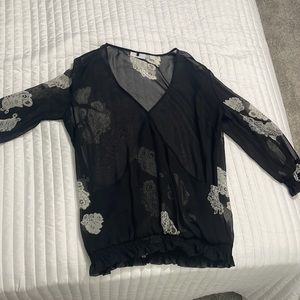 New you’re and company is the brand it’s a small and it is black and white sheer